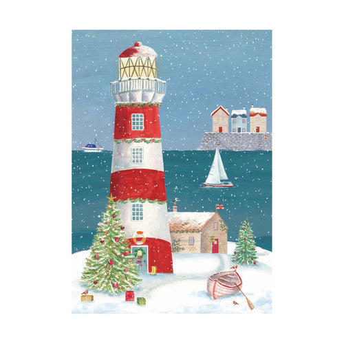 An illustrated, portrait Christmas card with an image of a red and white lighthouse amongst the snow with the sea behind. 