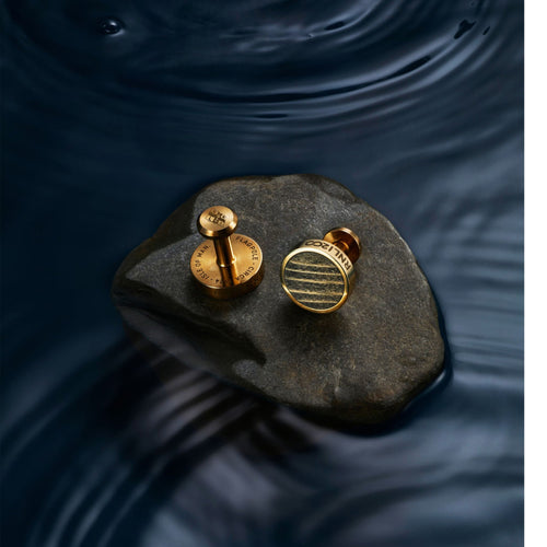 The RNLI 200 Limited Cufflinks – made from engraved brass and inlaid with wood from an RNLI flagpole.