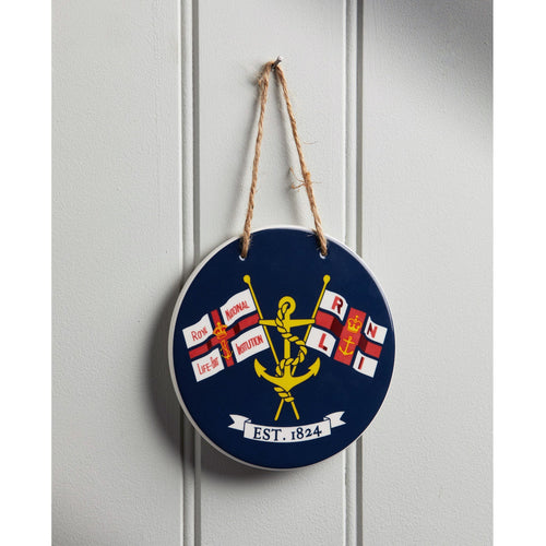 A navy, ceramic hanging sign with an RNLI heritage flag design.