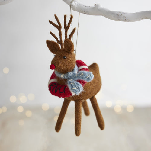 A hanging RNLI Reindeer decoration wearing a red Lifering round his neck.