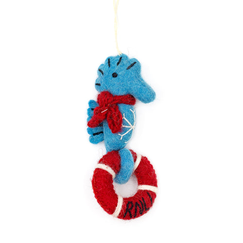 A hanging RNLI Seahorse decoration holding a red lifering with it's tail.