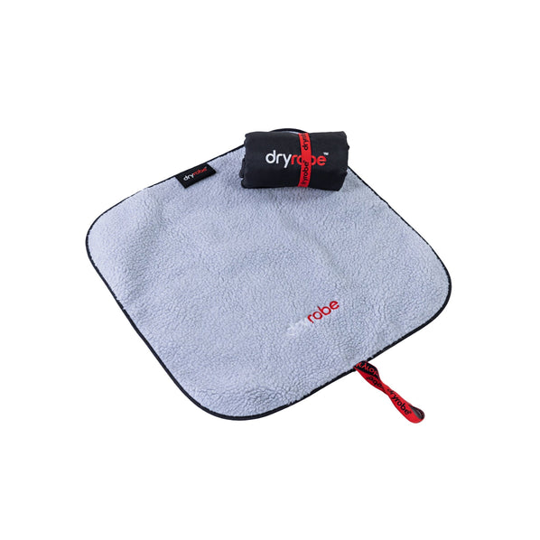 a grey and black Dryrobe Changing Mat. 
