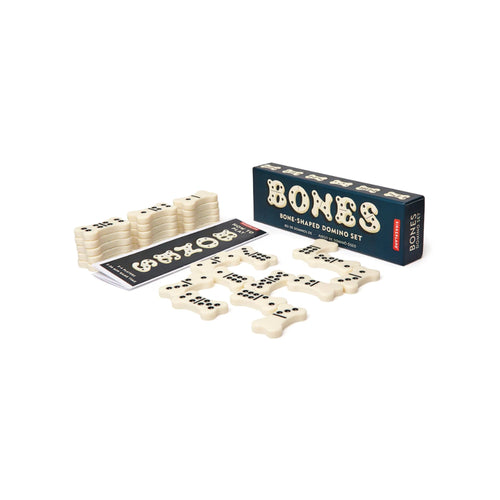 Kikkerland Bones Domino Set with a dark navy box and white tiles with black dots.