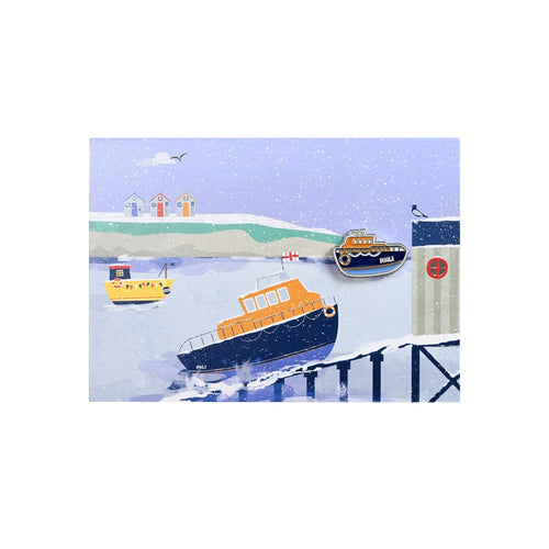 An illustrated, landscape Christmas card of an RNLI lifeboat launching to the rescue. 