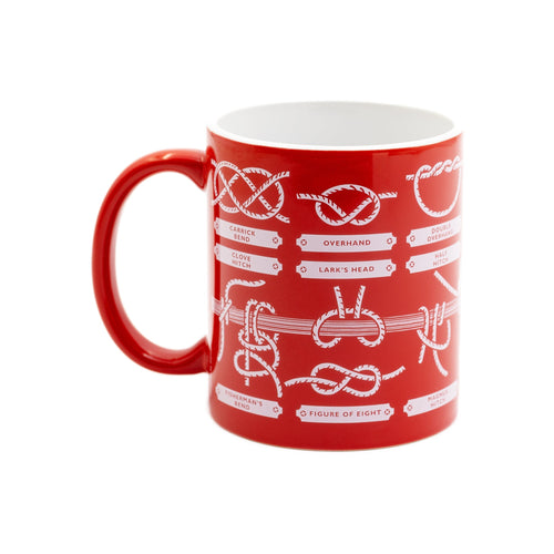 A red mug with white illustrations of sailing knots and their names. 